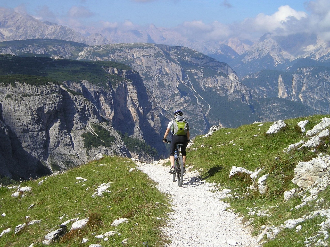 singletrail, mountain bike, bicycle, alpine cross, transalp, professional cyclist, athletic, sports, departure, path, trip, nature, touring bike, bike tour, dolomites, mountains, alps, south-tirol, italy, backpack